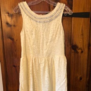 White lace dress with jewels and beads